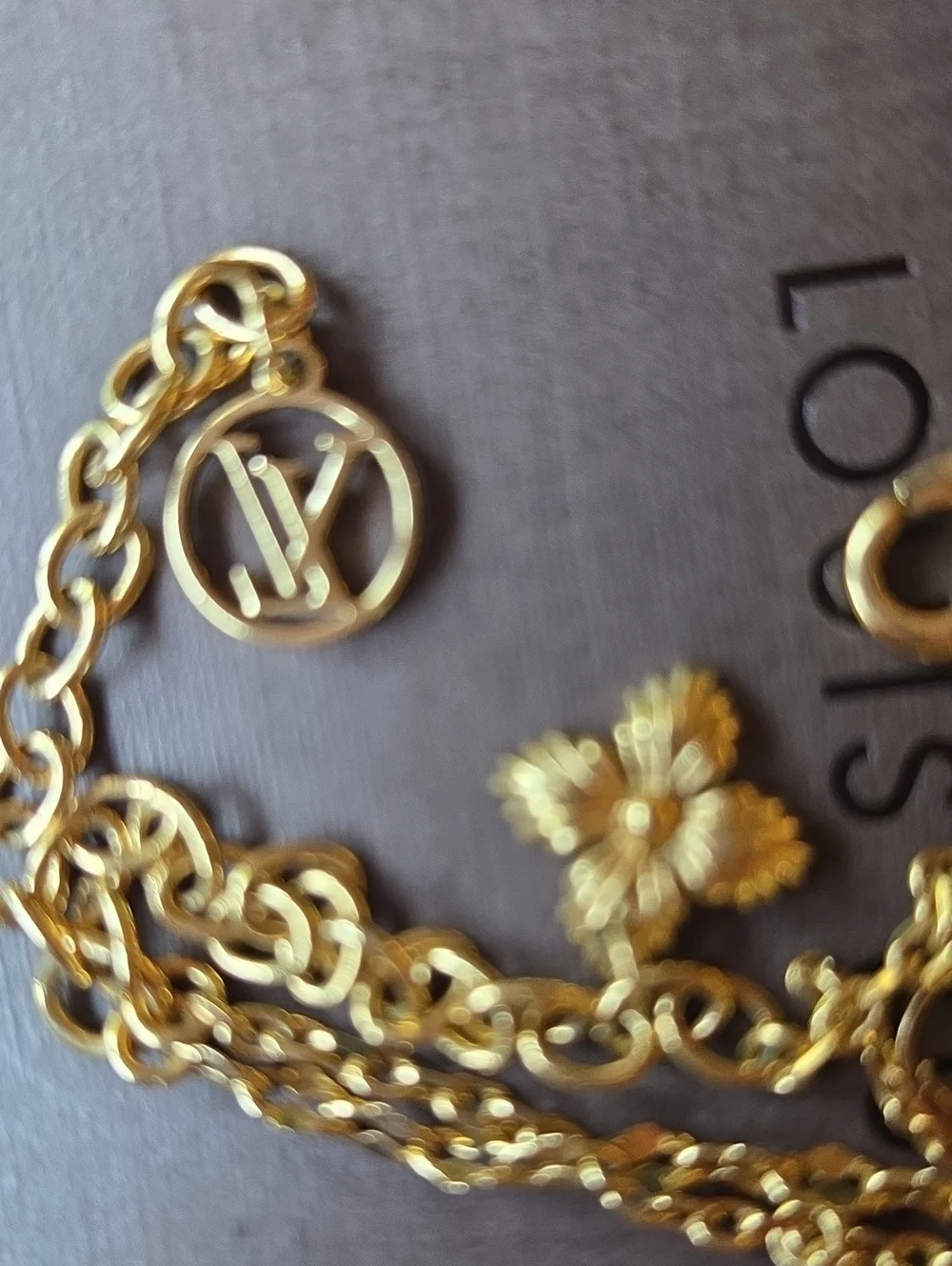 Louis Vuitton Gold Multi-Charm Layered Bracelet with Crystal Accents